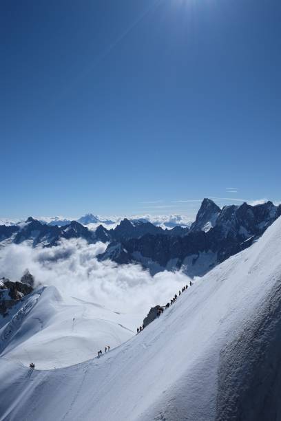 istock Vertical view of French Alps mountain range against a blue clear sky 1432823767