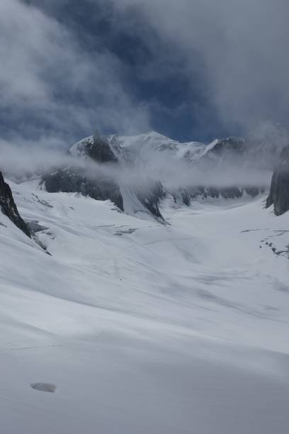 istock Vertical view of French Alps mountain range with low clouds 1432823769