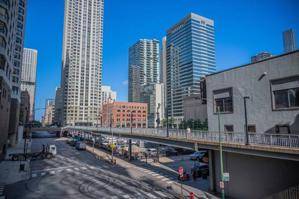 istock Tall modern buildings with a blue sky 1432824117