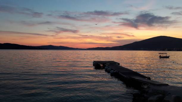 istock View of the empty dock at sunset. 1432828850
