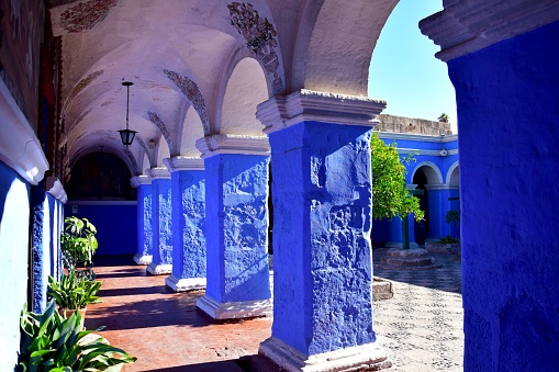 Traditional patio of an old house with typical colorful colonial architecture in Arequipa, Peru