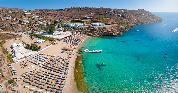 Panoramic view of the beautiful Super Paradise Beach at Mykonos island, Cyclades, Greece, during a sunny summer day