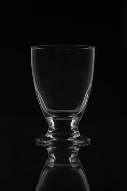 istock Vertical shot of an empty glass on the black background 1432831023