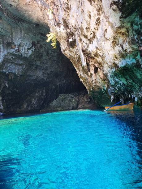 istock Vertical shot of a majestic blue water in a cave 1432833287