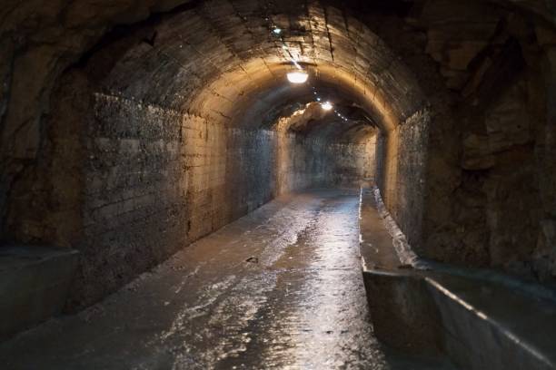 istock Humid tunnel with lights turned on connected to the Zerostrasse under the Pula Castle Kastel 1432836310