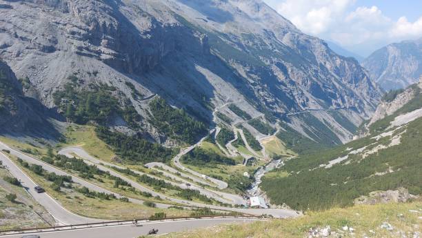 istock Beautiful shot of a road between mountains 1432838003