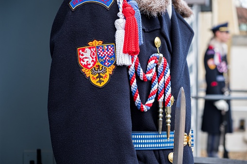 A closeup shot of military badges on a uniform