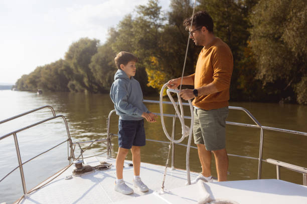 istock A father  teaches son how to sail 1432842840