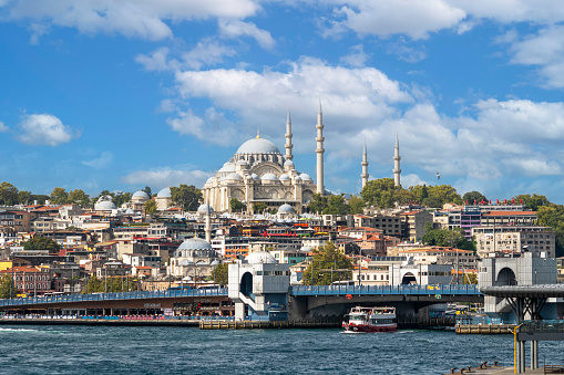 Istanbul, Turkey : September 06, 2022: Suleymaniye Mosque and Galata Bridge in day, Istanbul, Turkey