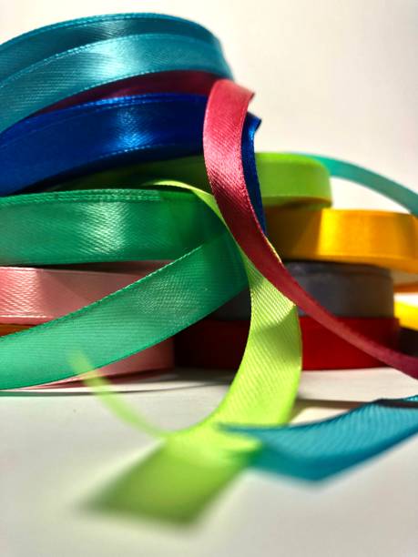 istock Pile of satin ribbon rolls 1432851286