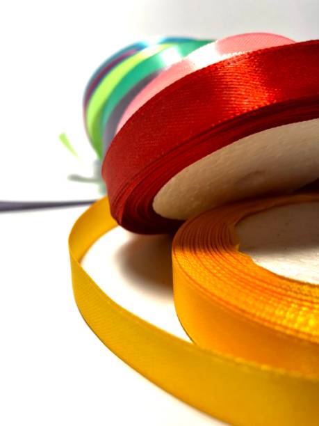 istock Half close view of satin ribbon rolls 1432852605