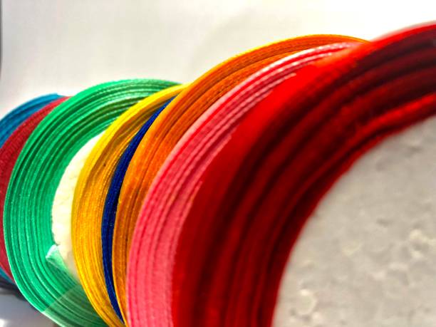 istock Lined up colorful ribbon disks 1432852775
