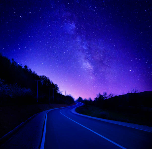 istock Milky Way above country road 1432856036