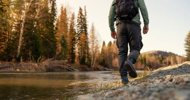 istock men's footsteps on the beach of river 1432856728