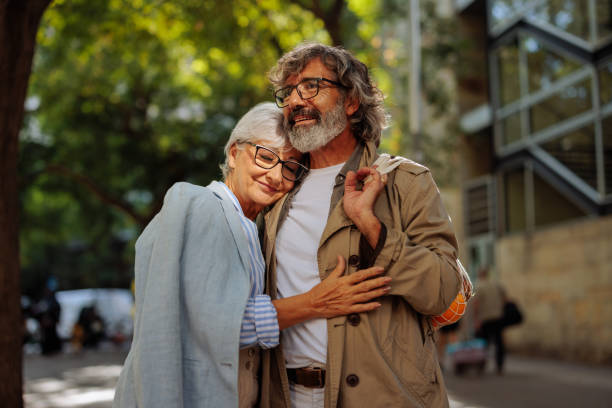 istock Smiling senior couple outside. 1432861067