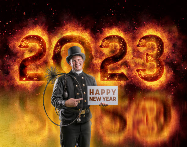 istock Chimney sweeper wishing Happy New Year 2023 in fire 1432861947