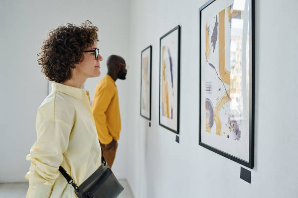 istock People enjoying art at gallery 1432866381