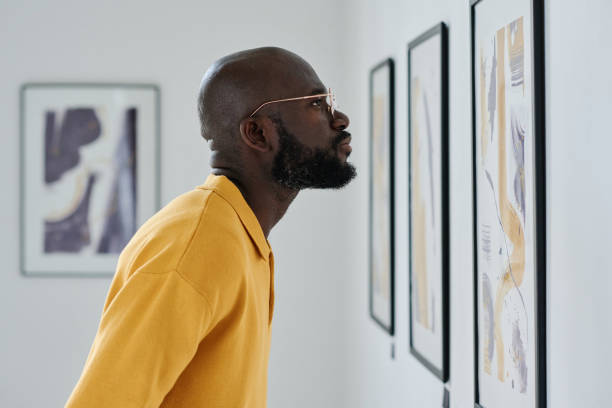 istock African man visiting art gallery 1432866444