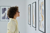 Woman visiting art gallery