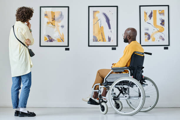 istock People watching pictures at gallery 1432866528