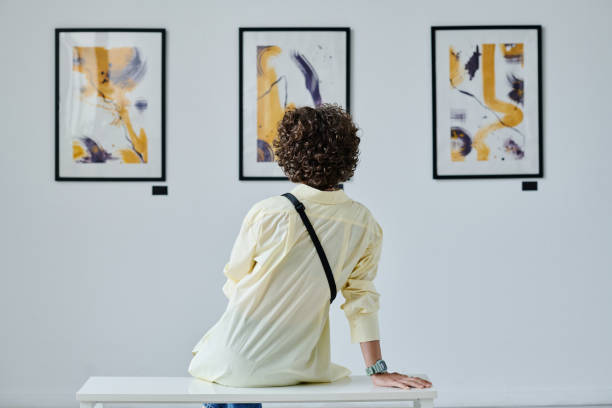 istock Woman enjoying the art at gallery 1432867096