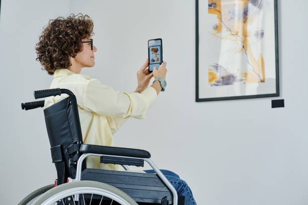 istock Woman using smartphone at art gallery 1432867381
