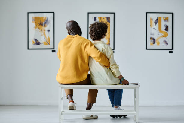 istock Multiethnic couple visiting art gallery 1432867440