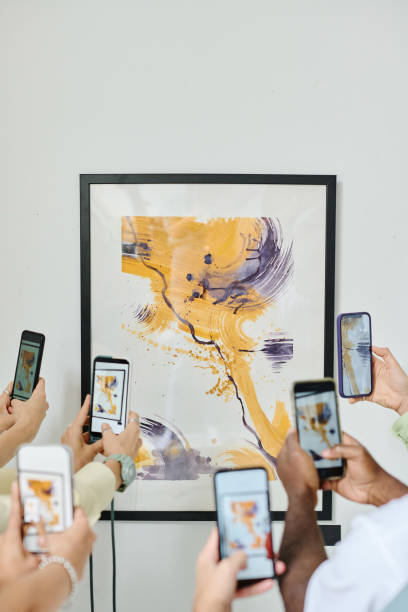 istock People photographing modern art at gallery 1432867591