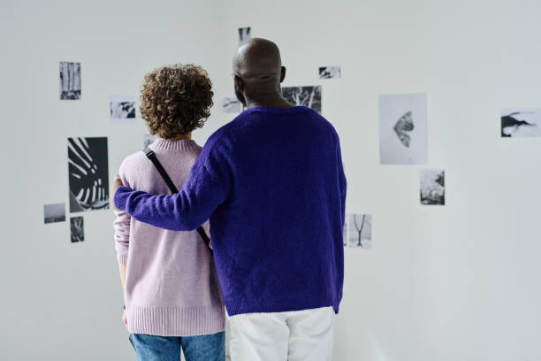 istock Multiethnic couple visiting photo gallery 1432867810