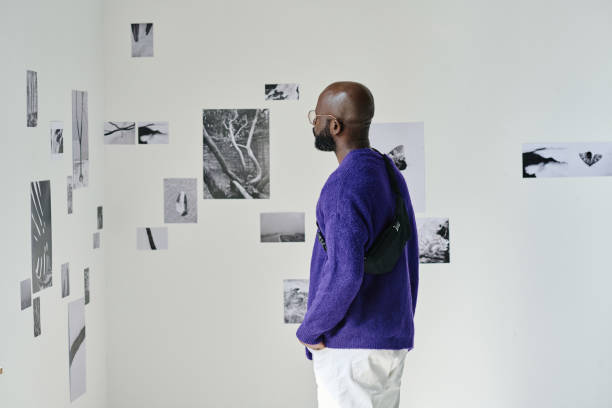istock Man visiting exhibition of modern art 1432867888