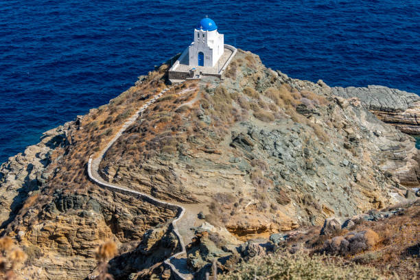 istock Greek Orthodox chapel on a rocky island outcrop 1432872437