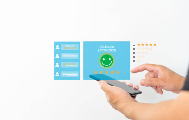 istock User give ratings to service experience on online application with smartphone, Man holding smartphone and chat with people ,Customer service experience and satisfaction survey in write wall background 1432875538