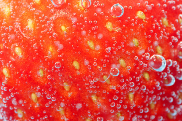 istock Strawberry close-up in water under water, macro, texture fresh berry. Selective focus 1432876133