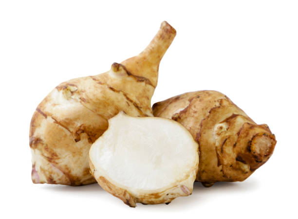 istock Jerusalem artichoke and half on a white background. Isolated 1432879431