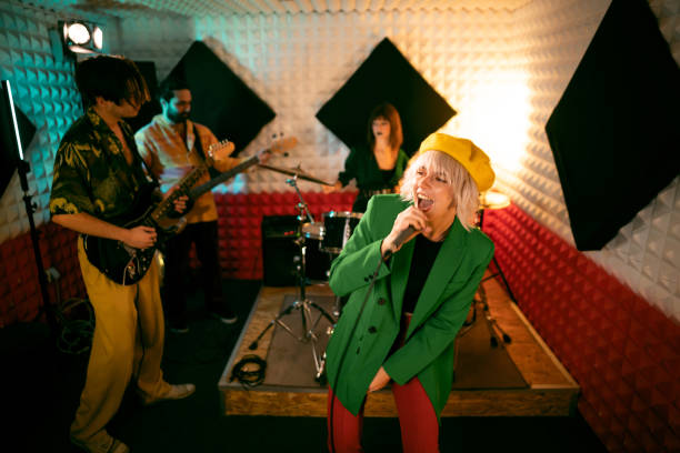 istock Modern musicians having rehearsal at the music recording studio 1432880939