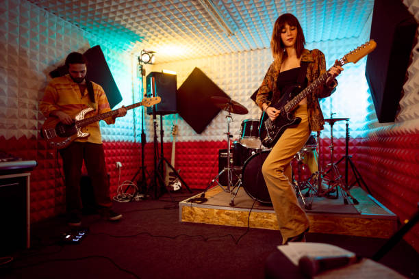 istock Band having rehearsal at the music recording studio 1432880950