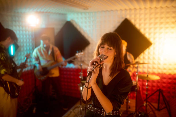 istock Rock band having rehearsal at the music recording studio 1432882159