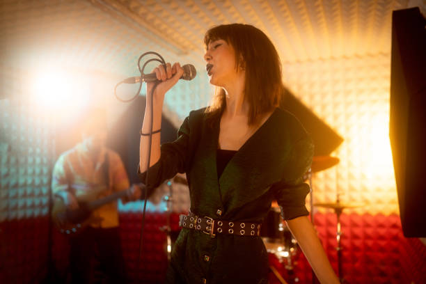istock Rock band having rehearsal at the music recording studio 1432882249