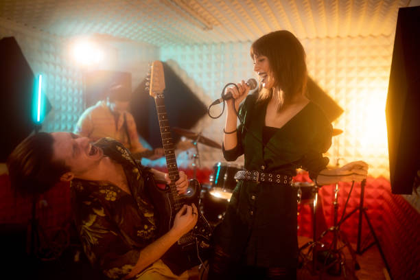 istock At the music studio, rock band having rehearsal 1432883205