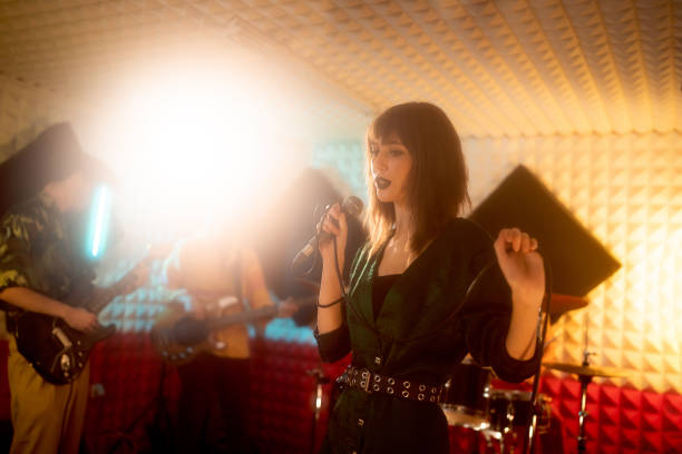 istock At the music studio, rock band having rehearsal 1432883501