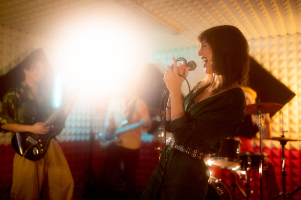 istock At the music studio, rock band having rehearsal 1432883726
