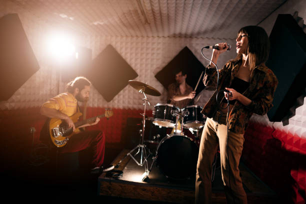 istock Band having rehearsal at the music recording studio 1432884065