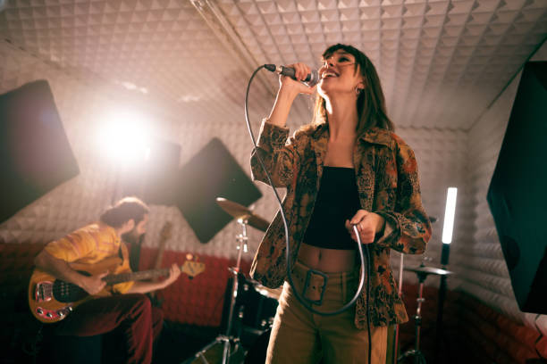 istock Band having rehearsal at the music recording studio 1432884292