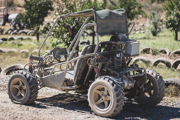 istock Old Quad Atv car on sand road 1432885528