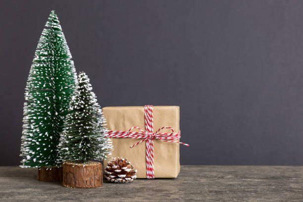 istock Christmas composition. Gifts, small tree, branches and craft DIY decorations on white background. New year concept. Christmas home decoration Flat lay, top view, copy space 1432886184