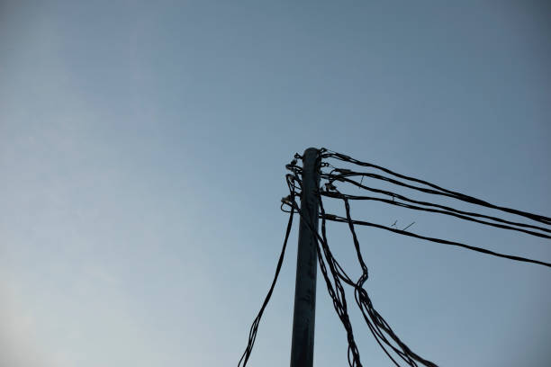 istock Electrical wires on pole. Many wires against sky. 1432886993