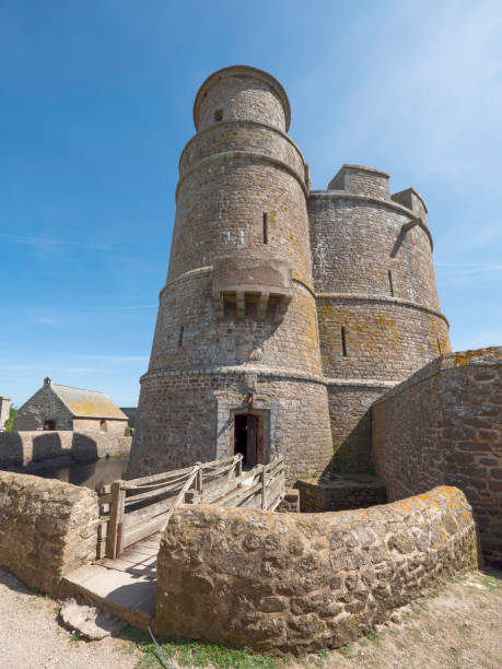 Small battlement on stepped corbels at the 1564 built Jardin du Cavalier Garden northwest corner, pointing to the 1652 built Tour Bidouane Tower at the Saint-Malo rampart NW extreme. Brittany-France.