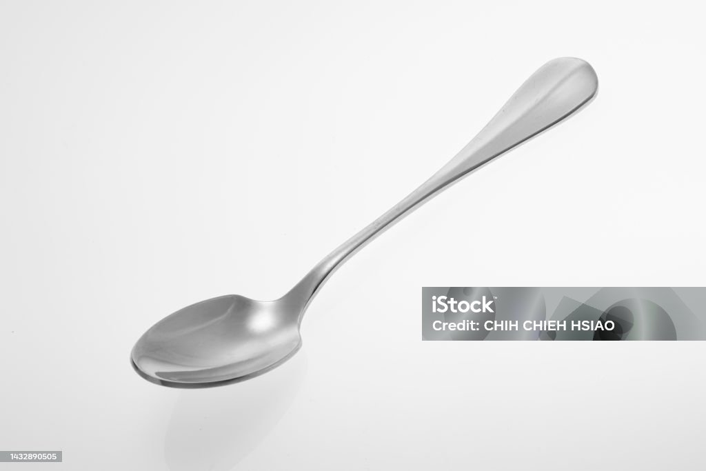 Silver spoon isolated on white background. Studio shot. Spoon Stock Photo