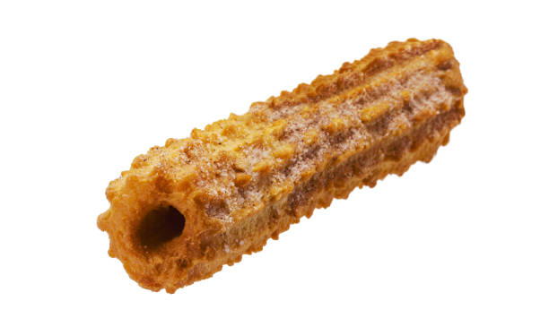 istock churros, fried sweet with granulated sugar, isolated white background, copyspace 1432890524
