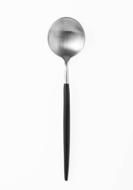 Wooden silver spoon isolated on white background.